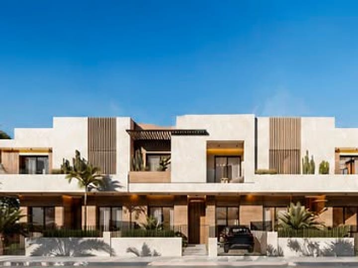 Vue de synthèse communiquée : alignement de villas en bande à deux façades.